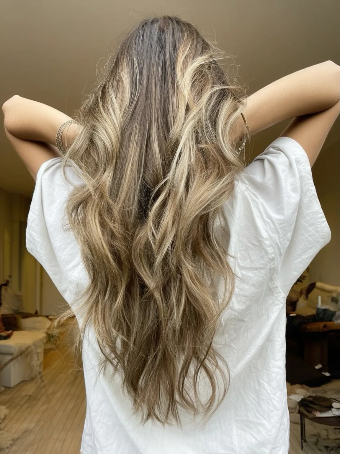 Voluminous Long Layers in Ash Blonde Balayage